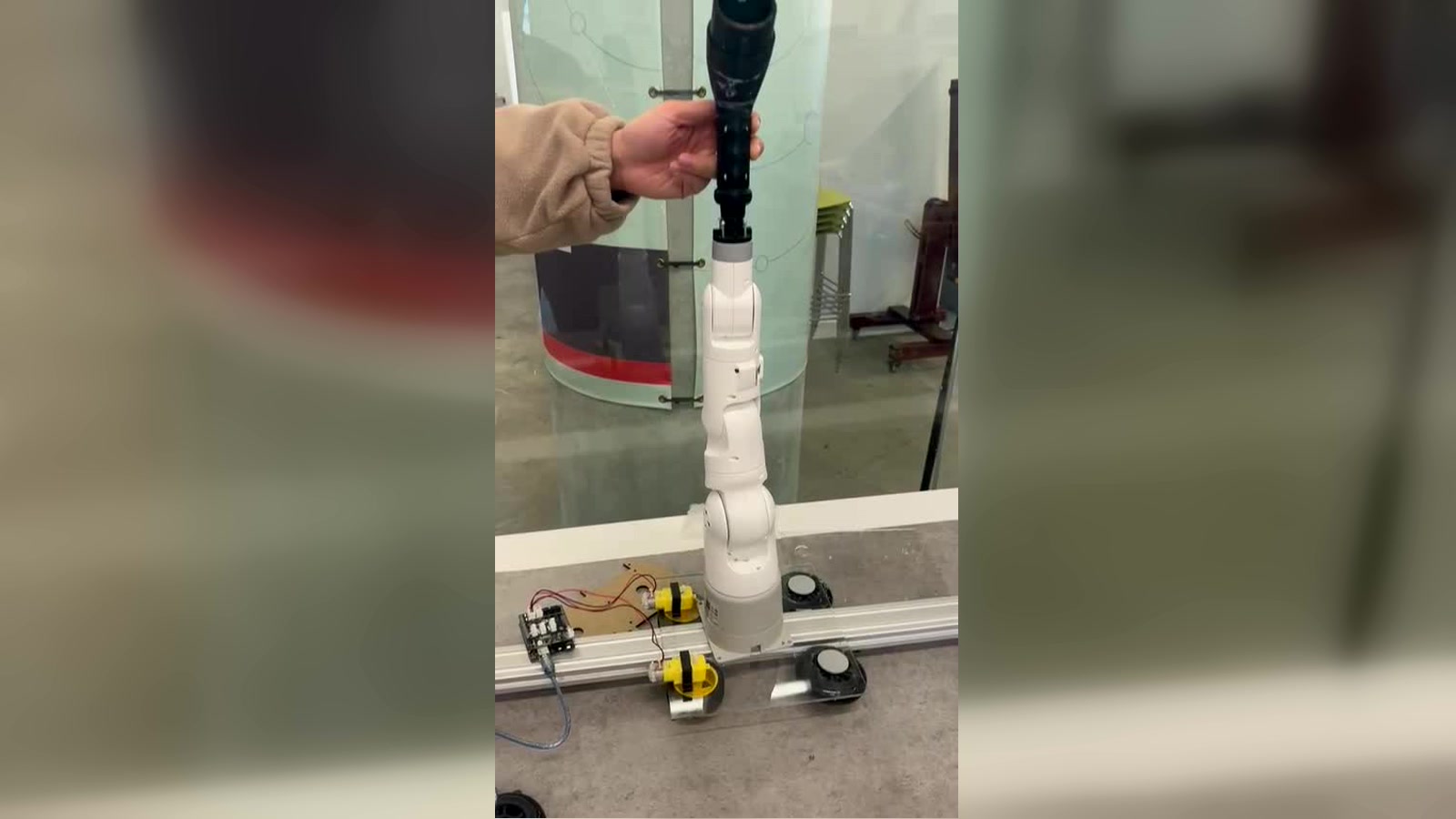 Robotic arm used during the JuicyEV automated charging development process.